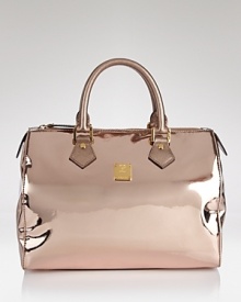 Make a celebratory statement. From MCM's 35-year anniversary capsule, bold patent leather and a structured silhouette lend this iconic satchel an air of glamour. Make a celebratory statement. From MCM's 35-year anniversary capsule, bold patent leather and a structured silhouette lend this iconic satchel an air of glamour.