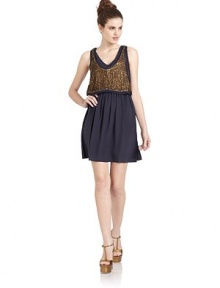 THE LOOKScoopneckSleevelessTextured trimCropped vest overlay with metallic sequin accentsGathered waistSide zip closureTHE FITAbout 34 from shoulder to hemTHE MATERIALSilkFully linedCARE & ORIGINDry cleanImportedModel shown is 5'10 (177cm) wearing US size 4. THE LOOKScoopneckSleevelessTextured trimCropped vest overlay with metallic sequin accentsGathered waistSide zip closureTHE FITAbout 34 from shoulder to hemTHE MATERIALSilkFully linedCARE & ORIGINDry cleanImportedModel shown is 5'10 (177cm) wearing US size 4.