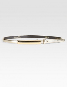 This slim, metallic leather style fastens with a chic, narrow rectangular buckle.About 1 wideLeatherMade in USA This slim, metallic leather style fastens with a chic, narrow rectangular buckle.About 1 wideLeatherMade in USA