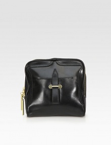 A boxy leather style that defines a style that is classic and cool.Detachable wristlet, 5 dropTop zip closureOne outside open pocketOne inside zip pocketFully lined7½W X 7H X 3½DImported A boxy leather style that defines a style that is classic and cool.Detachable wristlet, 5 dropTop zip closureOne outside open pocketOne inside zip pocketFully lined7½W X 7H X 3½DImported