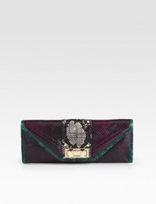 Colorblocking gives this embossed-leather clutch must-carry appeal.Turn-lock closureOne inside open pocketCotton lining11½W X 4½H X 1DImported Colorblocking gives this embossed-leather clutch must-carry appeal.Turn-lock closureOne inside open pocketCotton lining11½W X 4½H X 1DImported