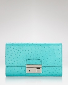 Michael Kors' ostrich-embossed clutch is the chicest way to make your look evening-ready. Richly textured and punctuated by bold hardware, it's an instant little black dress upper. Michael Kors' ostrich-embossed clutch is the chicest way to make your look evening-ready. Richly textured and punctuated by bold hardware, it's an instant little black dress upper.