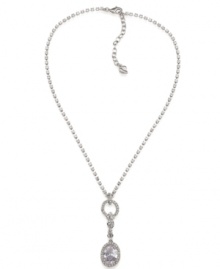 Definitely dazzling! Sparkling rhinestones combine with glittering glass accents on this stunning pendant necklace from Carolee. Set in silver tone mixed metal, it'll be sure to attract attention whenever you wear it. Approximate length: 16 inches + 2-inch extender. Approximate drop: 2-1/4 inches.