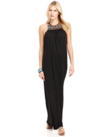 Southwestern-inspired beading along the neckline of this halter maxi dress offers a bit of bohemian flair to this relaxed look from MICHAEL Michael Kors. Southwestern-inspired beading along the neckline of this halter maxi dress offers a bit of bohemian flair to this relaxed look from MICHAEL Michael Kors.