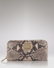 A glazed finish lends added luxe to this python-embossed leather wallet from MICHAEL Michael Kors. A glazed finish lends added luxe to this python-embossed leather wallet from MICHAEL Michael Kors.