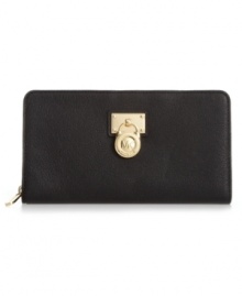 With a luxe 18K gold plaque and signature lock, it's easy to see why this sleek design from MICHAEL Michael Kors is the ultimate accessory. Sumptuous leather graces the exterior, while plenty of internal compartments for cards, cash and ID keep your essentials organized. With a luxe 18K gold plaque and signature lock, it's easy to see why this sleek design from MICHAEL Michael Kors is the ultimate accessory. Sumptuous leather graces the exterior, while plenty of internal compartments for cards, cash and ID keep your essentials organized.