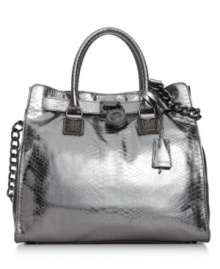 A shining example of exquisite style, this mod metallic tote from MICHAEL Michale Kors features croc-embossed leather with gleaming signature trim. Spacious, versatile and destined to be your go-to silhouette of the season. A shining example of exquisite style, this mod metallic tote from MICHAEL Michale Kors features croc-embossed leather with gleaming signature trim. Spacious, versatile and destined to be your go-to silhouette of the season.