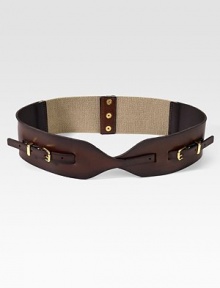A wide, leather design with dual-side buckles and a snap button, elastic back. Width, about 2½Made in USA A wide, leather design with dual-side buckles and a snap button, elastic back. Width, about 2½Made in USA