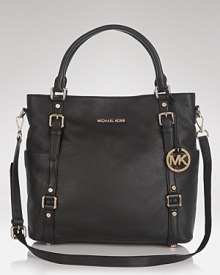 Stay one step ahead of the in-crowd with this leather tote from MICHAEL Michael Kors. Ideal for days on the go, it's the perfect fusion or form, fashion and function. Stay one step ahead of the in-crowd with this leather tote from MICHAEL Michael Kors. Ideal for days on the go, it's the perfect fusion or form, fashion and function.