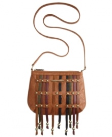 A blast from the past gets a modern update with this cool crossbody from Roxy. Groovy, multi-tonal fringe is accented with chic stud detailing, for a look that goes from sit-in to sit-down dinner in a snap. A blast from the past gets a modern update with this cool crossbody from Roxy. Groovy, multi-tonal fringe is accented with chic stud detailing, for a look that goes from sit-in to sit-down dinner in a snap.