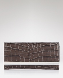 This MICHAEL Michael Kors carryall fits the bill for endlessly busy days, crafted of exotically embossed leather with ample essential-organizing pockets. This MICHAEL Michael Kors carryall fits the bill for endlessly busy days, crafted of exotically embossed leather with ample essential-organizing pockets.
