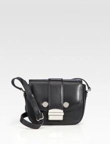 Crafted from supple leather, this petite design is dressed up with bold metallic hardware.Adjustable shoulder strap, 15½-19 drop Front flap buckle closure Inside zip, PDA and cellphone pockets Fully lined 6½W X 6H X 1¾D Made in Italy Crafted from supple leather, this petite design is dressed up with bold metallic hardware.Adjustable shoulder strap, 15½-19 drop Front flap buckle closure Inside zip, PDA and cellphone pockets Fully lined 6½W X 6H X 1¾D Made in Italy