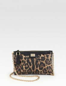 A bold leopard-print characterizes this mini crossbody with a gleaming chain strap. Chain shoulder strap, 50 dropTop zip closureOne inside open pocketFully lined8W X 5H X 1DMade in Italy A bold leopard-print characterizes this mini crossbody with a gleaming chain strap. Chain shoulder strap, 50 dropTop zip closureOne inside open pocketFully lined8W X 5H X 1DMade in Italy