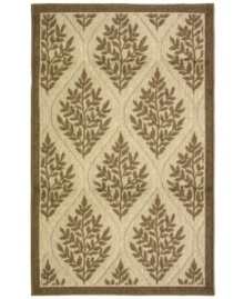 A geometric leaf design presents a modern look in this Revena accent rug from Bacova, featuring a neutral colorway to match any home decor. Finished with a woven loop construction for unique texture and skid-resistant backing for safety.