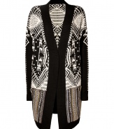 Travel the urban jungle in style in Antik Batiks eye-catching patterned jacquard cardigan, cozy, contemporary, and incredibly unique - Ribbed knit collar and front paneling, long sleeves, ribbed trim, contrast paneling around the bottom, patch pockets - Long straight silhouette - Team with leather leggings, tees and chunky biker boots