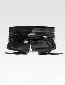A statement style with a wide, textured leather sash, logo embossed metal accent and a multi-wrapped, patent leather tie. Width, about 4½Imported A statement style with a wide, textured leather sash, logo embossed metal accent and a multi-wrapped, patent leather tie. Width, about 4½Imported