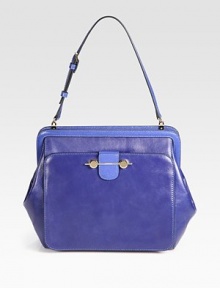 Luxurious leather with beautiful saffiano leather accents in a roomy carryall design.Adjustable shoulder strap, 7½-8¾ dropTop zip closureOne outside open pocket with flap closureOne inside zip pocketTwo inside open pocketsSilk blend lining9½W X 11½H X 4DMade in Italy Luxurious leather with beautiful saffiano leather accents in a roomy carryall design.Adjustable shoulder strap, 7½-8¾ dropTop zip closureOne outside open pocket with flap closureOne inside zip pocketTwo inside open pocketsSilk blend lining9½W X 11½H X 4DMade in Italy