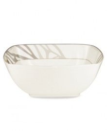 Abstract markings in soft shades of khaki fill in this glazed white serving bowl for unconventional elegance. Trimmed with matte platinum, its sleek, modern shape looks sharp on casual and formal tables alike. From Noritake's collection of serveware and serving dishes.