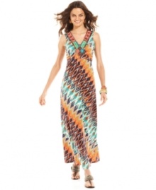 Festive beads and a colorful tribal print turn this fluid NY Collection maxi dress into a seasonal statement piece. When you're not going barefoot on the beach, statement sandals finish the look in style.