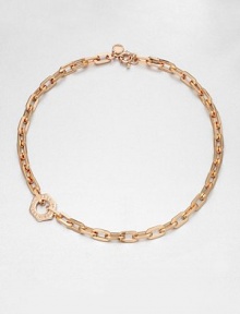 A logo accented nut charm sits off-center on a narrow, chain link design. Rose goldtone brassLength, about 7.6Pendant size, about .75Spring ring closureImported A logo accented nut charm sits off-center on a narrow, chain link design. Rose goldtone brassLength, about 7.6Pendant size, about .75Spring ring closureImported
