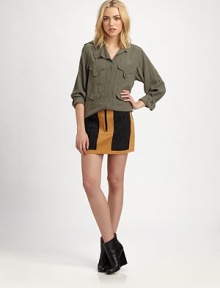 Classic utility-chic employed in oversized storm-flap pockets on finely-woven silk.Button-front band collarEpaulettesStorm-flap pocketsButton-down placketShirttail hem longer in backAbout 27 from shoulder to hemSilkDry cleanModel shown is 5'10 (178cm) wearing US size 4. Classic utility-chic employed in oversized storm-flap pockets on finely-woven silk.Button-front band collarEpaulettesStorm-flap pocketsButton-down placketShirttail hem longer in backAbout 27 from shoulder to hemSilkDry cleanModel shown is 5'10 (178cm) wearing US size 4.
