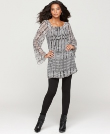 Sheer sleeves and an intricate print make One World's flowing dress a unique piece for any closet. Perfect with knee-high boots and leggings! Sheer sleeves and an intricate print make One World's flowing dress a unique piece for any closet. Perfect with knee-high boots and leggings!