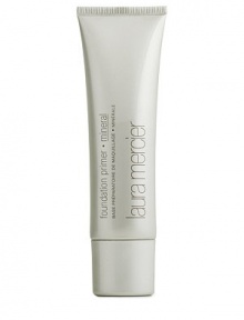 A mineral foundation primer that primes skin to achieve a smoother, more even application of Laura Mercier's mineral formulas. A mineral foundation primer that primes skin to achieve a smoother, more even application of Laura Mercier's mineral formulas.
