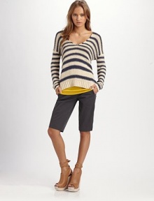 Striped, cotton-rich v-neck in allover stripes with dropped shoulders and a sexy v-back. V-neckDropped shouldersLong sleevesRibbed hemV-back70% cotton/30% nylonDry cleanImportedModel shown is 5'10 (177cm) wearing US size 4.