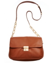 Whether dashing across town or across the country, this versatile design from DKNY will get you there in style. Posh goldtone accents and a classic pushlock closure add glam appeal to this everyday look. Whether dashing across town or across the country, this versatile design from DKNY will get you there in style. Posh goldtone accents and a classic pushlock closure add glam appeal to this everyday look.