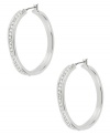 Classic cool. Hoop earrings from Robert Lee Morris get a sparkling touch with glass pave crystal accents. Crafted from silver-tone mixed metal. Approximate diameter: 1-1/4 inches. Approximate drop: 1-5/8 inches.