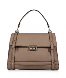The ultimate investment piece, this Valentino purse boasts a classic shape with modernized styling - Top carrying handle, front flap, gold-tone hardware and front stud detail - Perfect for everyday use or for early evening cocktails The ultimate investment piece, this Valentino purse boasts a classic shape with modernized styling - Top carrying handle, front flap, gold-tone hardware and front stud detail - Perfect for everyday use or for early evening cocktails