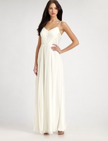 Crisp pleated details and embroidered lace bodice insets lend texture to this ethereal, floor-length design.Spaghetti strapsSweetheart necklinePleated bodiceLace insetsFron pleats on skirtConcealed back zipFully linedAbout 40 from natural waistSilkDry cleanImportedModel shown is 5'11 (180cm) wearing US size 4. Crisp pleated details and embroidered lace bodice insets lend texture to this ethereal, floor-length design.Spaghetti strapsSweetheart necklinePleated bodiceLace insetsFron pleats on skirtConcealed back zipFully linedAbout 40 from natural waistSilkDry cleanImportedModel shown is 5'11 (180cm) wearing US size 4.