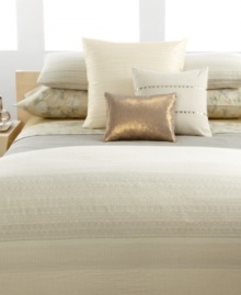 Two rows of horizontal coins line this pillow for a strong impression that ties the colors of your bed together. Strong detailing and unique textures punctuate the subtle nude tone. Two rows of horizontal coins line this pillow for a strong impression that ties the colors of your bed together. Strong detailing and unique textures punctuate the subtle nude tone.
