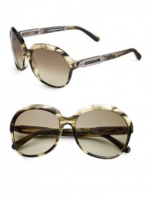 THE LOOKOversized round styleAcetate framesMetal accented templesUVA and UVB protectionSignature case includedORIGINMade in Italy THE LOOKOversized round styleAcetate framesMetal accented templesUVA and UVB protectionSignature case includedORIGINMade in Italy