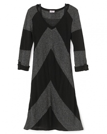 This demi-sheer Splendid dress dazzles with bold alternating stripes in black and silver metallic and a removable cami slip. This demi-sheer Splendid dress dazzles with bold alternating stripes in black and silver metallic and a removable cami slip.