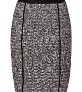 Work a lady-chic edge into your contemporary tailored look with DKNYs optical tweed skirt - Black trim, hidden back zip, kick pleat - Paneled, form-fitting silhouette - Team with blazers, feminine tops, and chic streamlined accessories