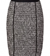 Work a lady-chic edge into your contemporary tailored look with DKNYs optical tweed skirt - Black trim, hidden back zip, kick pleat - Paneled, form-fitting silhouette - Team with blazers, feminine tops, and chic streamlined accessories