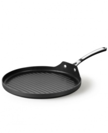 Grilling doesn't have to be an outdoor-only activity. This grill pan from Simply Calphalon cooks up hearty steaks and juicy burgers, searing on grill marks and sealing in flavors with its ridged hard-anodized surface, double coated with an exclusive nonstick formula. 10-year warranty. Grilling doesn't have to be an outdoor-only activity. This grill pan from Simply Calphalon cooks up hearty steaks and juicy burgers, searing on grill marks and sealing in flavors with its ridged hard-anodized surface, double coated with an exclusive nonstick formula. 10-year warranty.