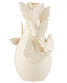 The essence of whimsy, this Lenox Flutter bud vase will lift your spirits with gold-tipped butterflies and elegant banding in timeless ivory porcelain.