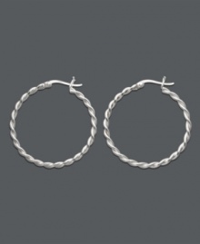 Giani Bernini puts a little spin on a style must-have. Earrings feature a traditional hoop design with a chic twist. Crafted in sterling silver. Approximate diameter: 1-1/4 inches. Giani Bernini puts a little spin on a style must-have. Earrings feature a traditional hoop design with a chic twist. Crafted in sterling silver. Approximate diameter: 1-1/4 inches.