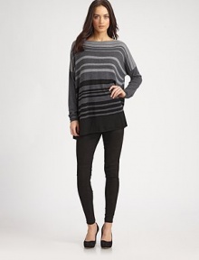 Array of bold, tonal stripes and long dolman sleeves invigorate this sophisticated, wool-blend boatneck. BoatneckDropped shouldersLong dolman sleevesLonger length hits below the hips55% merino wool/25% viscose/20% nylonDry cleanImportedModel shown is 5'10 (177cm) wearing US size Small.