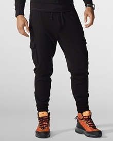 Perfect for both lazy days or working up a sweat, a cargo-style sweatpant is crafted in lightweight fleece for comfort with superior shape retention. Perfect for both lazy days or working up a sweat, a cargo-style sweatpant is crafted in lightweight fleece for comfort with superior shape retention.