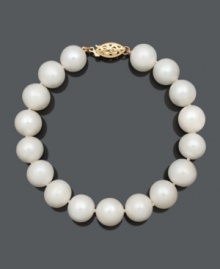 Freshen your look with a simple strand of crisp, white pearls. This polished bracelet features cultured freshwater pearls (10-11 mm) with a 14k gold clasp. Approximate length: 7-1/2 inches. Freshen your look with a simple strand of crisp, white pearls. This polished bracelet features cultured freshwater pearls (10-11 mm) with a 14k gold clasp. Approximate length: 7-1/2 inches.