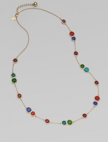 This 12k gold plated design features multiple stations on a delicate link chain. 12k goldplated white metalGlass beadsLength, about 32Lobster clasp closureImported 
