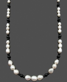 Chic contrasting colors. Cultured freshwater pearls (5-10 mm) and round onyx beads (4 mm and 6 mm) combine for a standout look on this sophisticated strand. Clasp crafted in 14k gold. Approximate length: 24 inches.