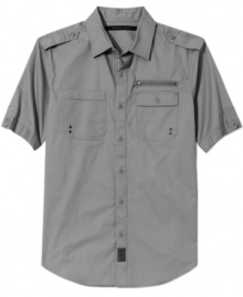 A short-sleeved utility shirt with the full-on complement of pockets, epaulets, zippers, buttons, and grommets in full-on Sean John style.