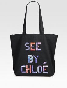 A quirky canvas style with a patchwork logo front.Double shoulder straps, 10 dropOpen top14½W X 11H X 4DImported A quirky canvas style with a patchwork logo front.Double shoulder straps, 10 dropOpen top14½W X 11H X 4DImported