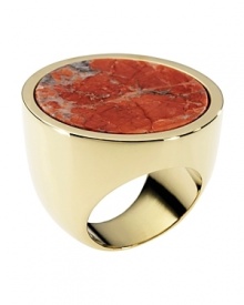 Crafted of gold tone with a boldly colored coral howlite stone, this disc-shaped ring from MICHAEL Michael Kors is a natural focal point.