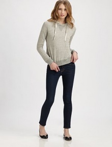 Incredible softness and clever stitching on the hood give this casual design must-have appeal. Attached hoodLong sleevesAbout 19 from shoulder to hemCottonMachine washImported