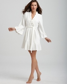 Indulge yourself with this plush three-quarter sleeve terry robe.